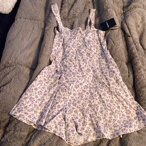 Brand new with tags purple flower romper from forever 21